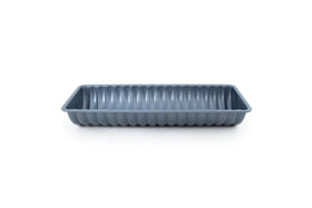 Fox Run Rehrucken almond cake pan with baked cake ready for slicing.
