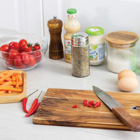 Fox Run spice jar with shaker top enables easy dispensing of herbs.