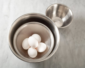Fox Run bowl with flat base for stable mixing and mess-free pouring.