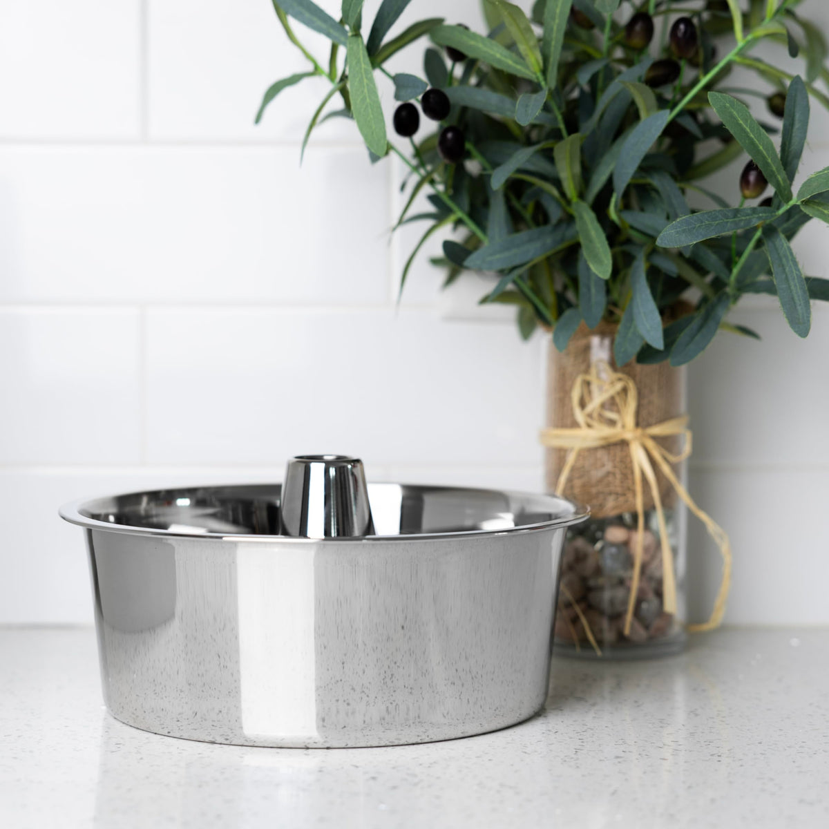 Fox Run stainless steel tube cake pan provides even heat for consistent baking.