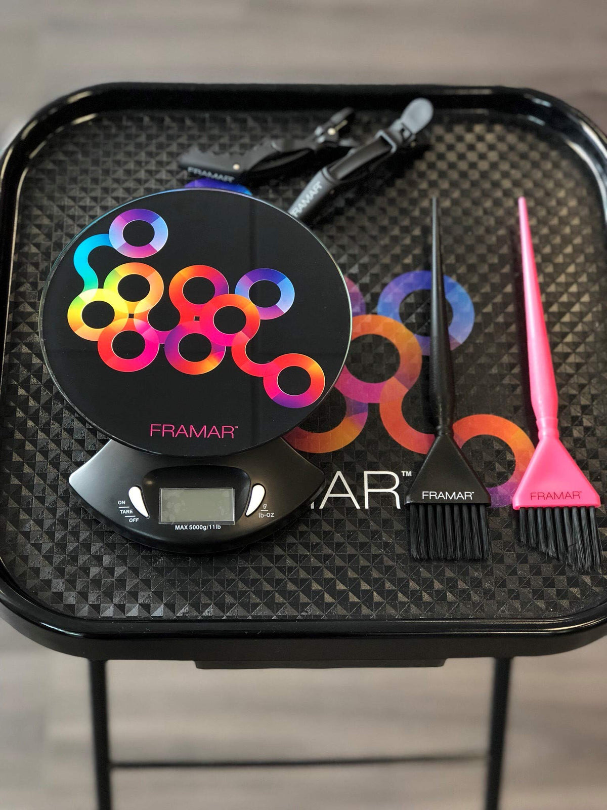 FRAMAR tempered glass top is easy to clean and stylish for any workspace