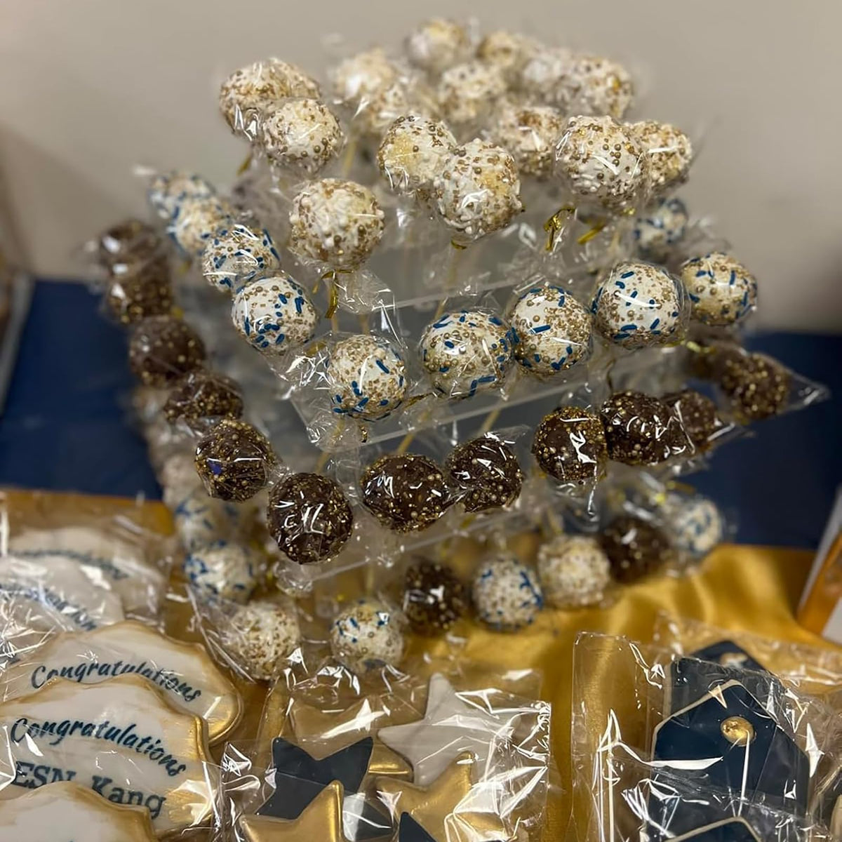 Close-up of cake pops arranged on the stand