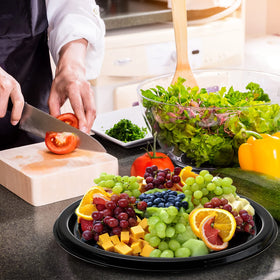 Frcctre catering tray displaying sandwiches and cheeses neatly.