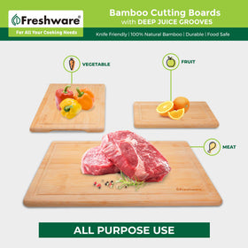 Freshware bamboo cutting board large 15x10 with built-in handles for serving.