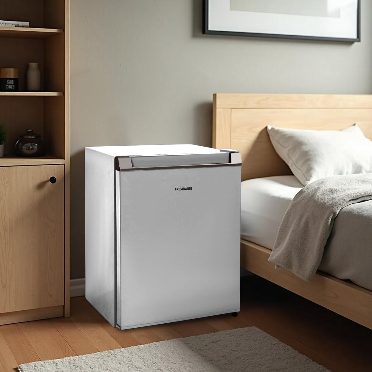 Frigidaire 1.6 cu ft compact fridge in a modern kitchen nook.