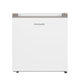 Frigidaire compact fridge side view shows reversible doors for flexible placement.