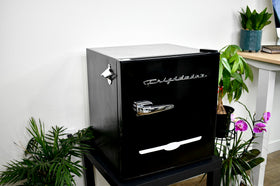 Frigidaire black retro mini fridge interior with slide-out shelves for easy organization.
