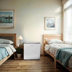 Frigidaire compact fridge interior with adjustable shelves for flexible storage.