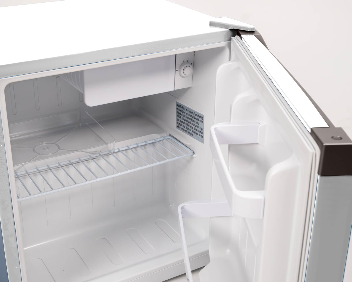 Frigidaire ice cube chamber 0.3 cu ft at 32 degrees Fahrenheit.