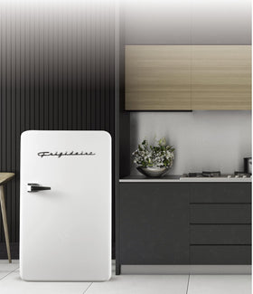 Frigidaire Retro Compact Refrigerator door open with built-in bottle opener