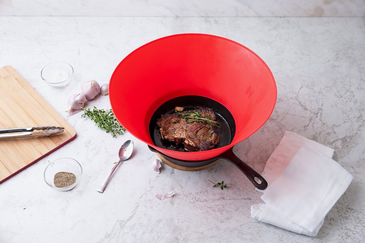 Frywall dishwasher-safe silicone guard for quick cleaning after frying.