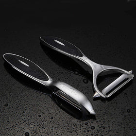 FUHUY multi-purpose peeler handles apples, carrots, and cucumbers with ease