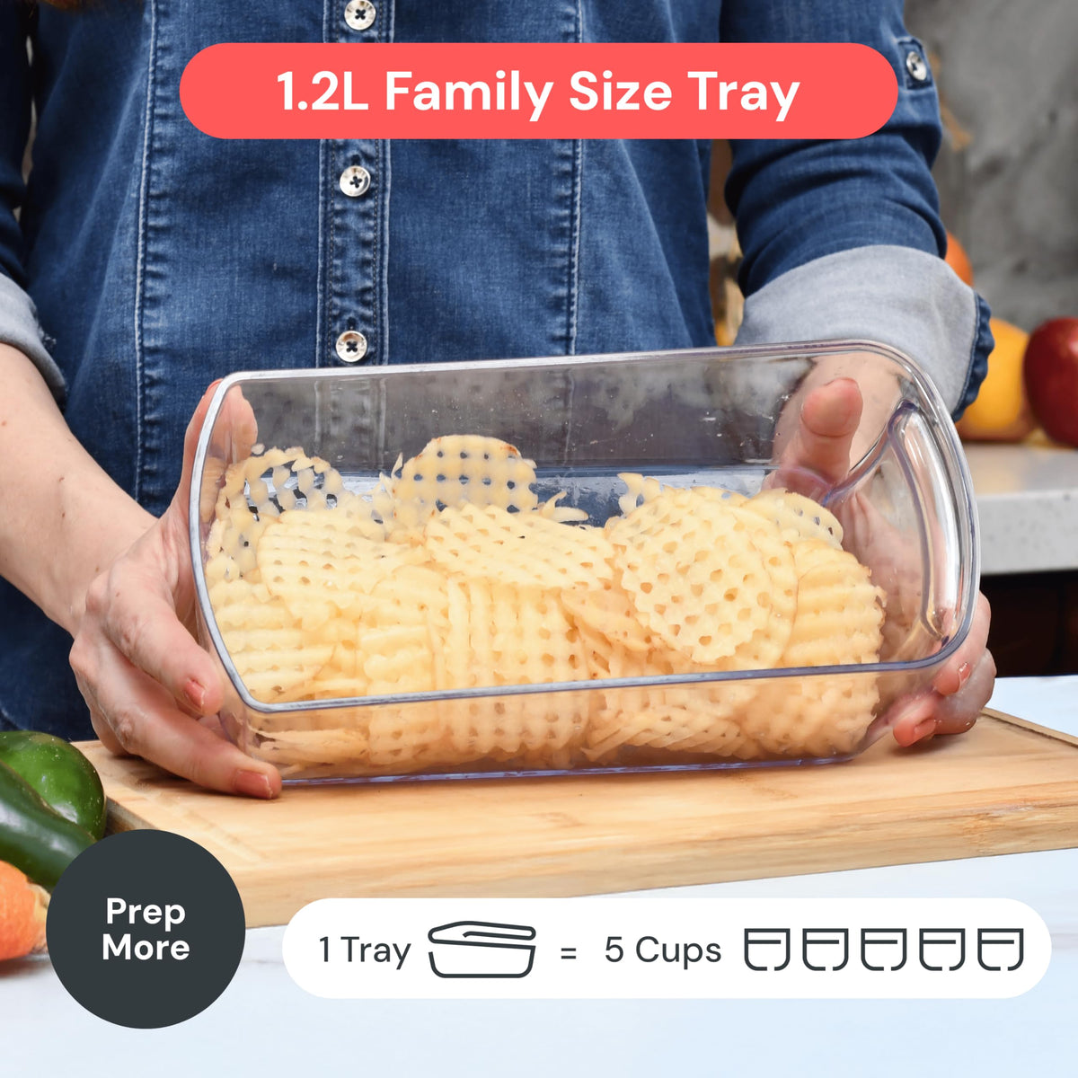 Fullstar All-in-1 chopper catches scraps in a built-in tray to reduce mess.