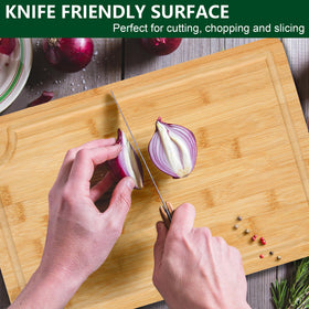 Funnydin bamboo cutting board with hanging holes for air drying after washing.