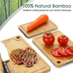 Funnydin bamboo cutting board side handles improve grip during tasks.