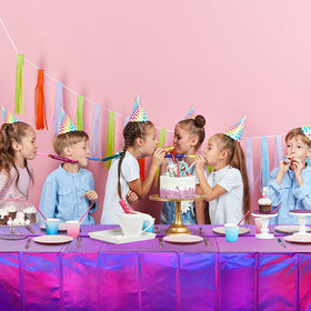 FunnyPars iridescent purple foil tablecloth adds rich textures under stage lighting.
