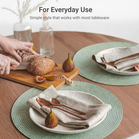 Easy cleaning action, wiping with a cloth to remove a spill.