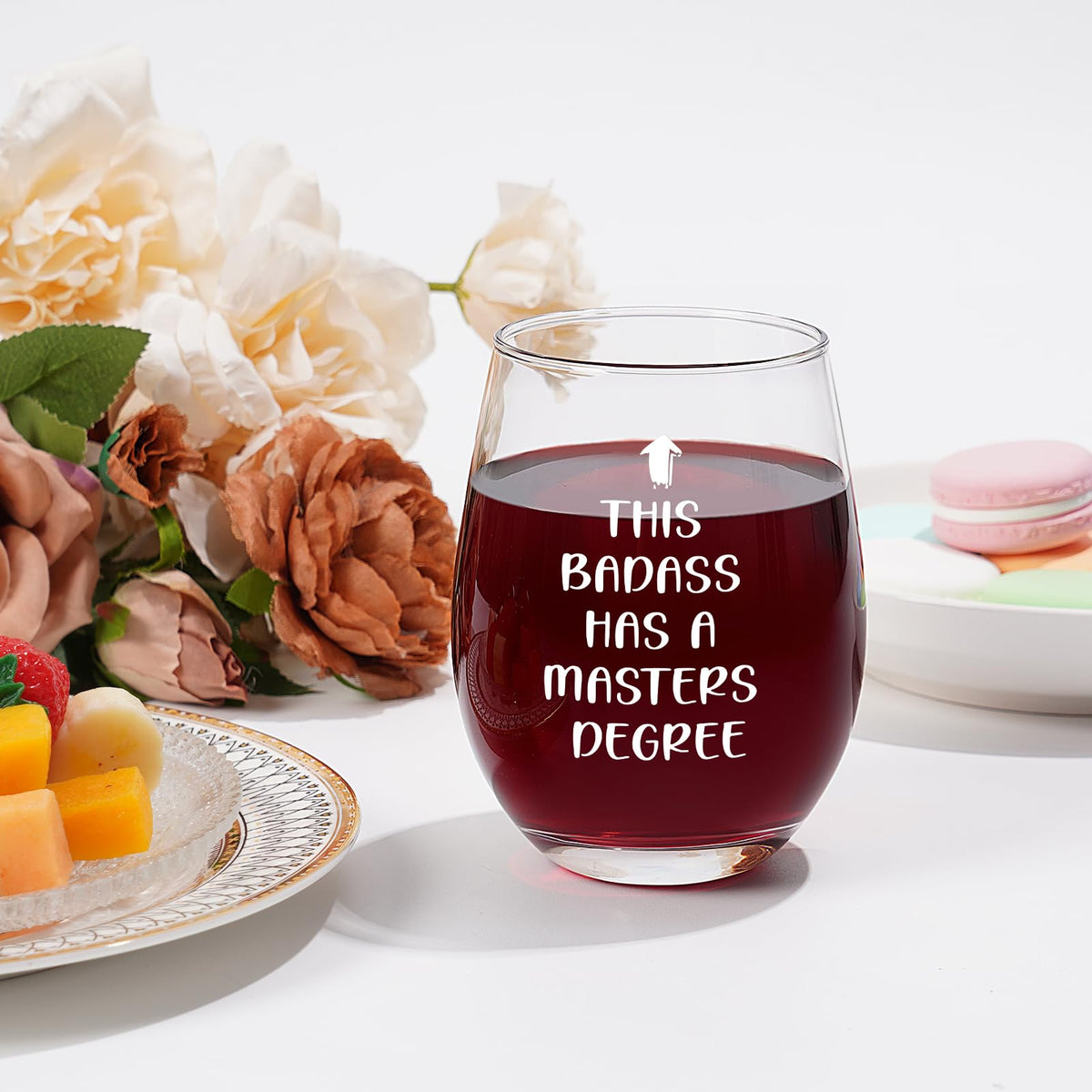Futtumy Masters Degree stemless wine glass angled pour, shows ergonomic grip.