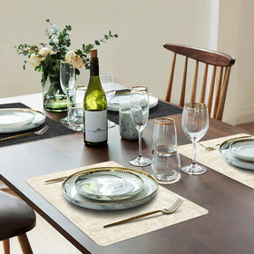 Fyvva coasters match placemats to protect surfaces from condensation.