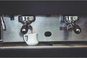 Gaggia descaler close-up showing the granular formula for scale removal