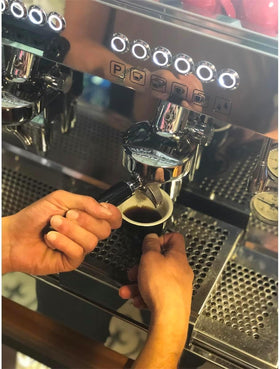 Gaggia descaler tablets in use inside an espresso machine for clean water flow