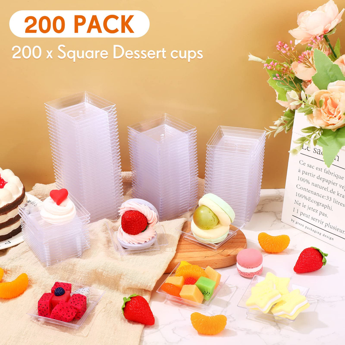 Clear plastic Gandeer plates on a stylish serving spread.
