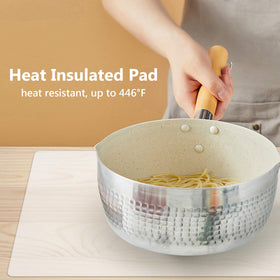Gartful silicone mat acts as a trivet protecting surfaces.