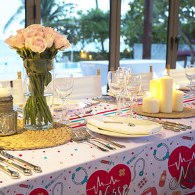 Gatherfun disposable waterproof tablecloth protects surfaces while hosting lively medical-themed events