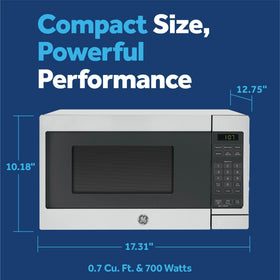 GE microwave control panel close-up with Instant On and quick-heat settings