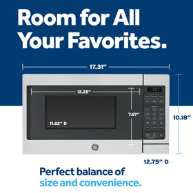 GE countertop microwave interior image with turntable highlights even heating for balanced cooking.