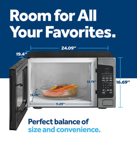 GE countertop microwave turntable inside demonstrates even heating for leftovers.