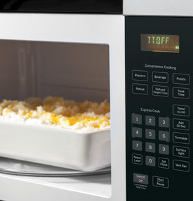 GE JVM3160RFSS vent system removes steam and cooking odors.