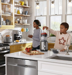 GE stainless steel toaster on a modern countertop.