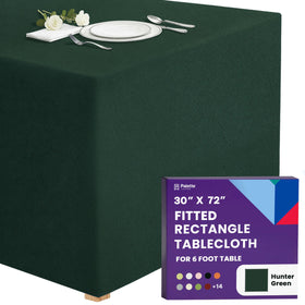 Gee Di Moda fitted tablecloth on a 6-foot table in hunter green for a polished look.