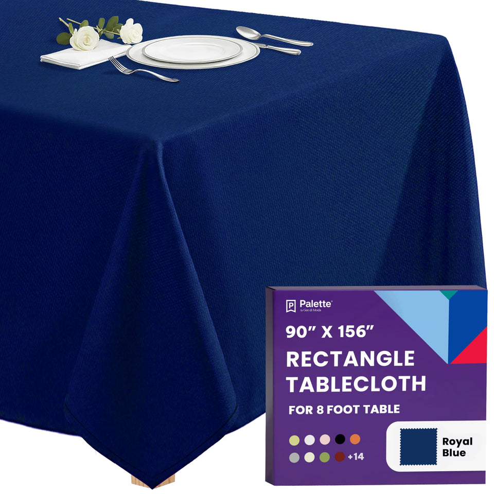Gee Di Moda rectangle tablecloth in royal blue on an eight-foot table for elegant dining.