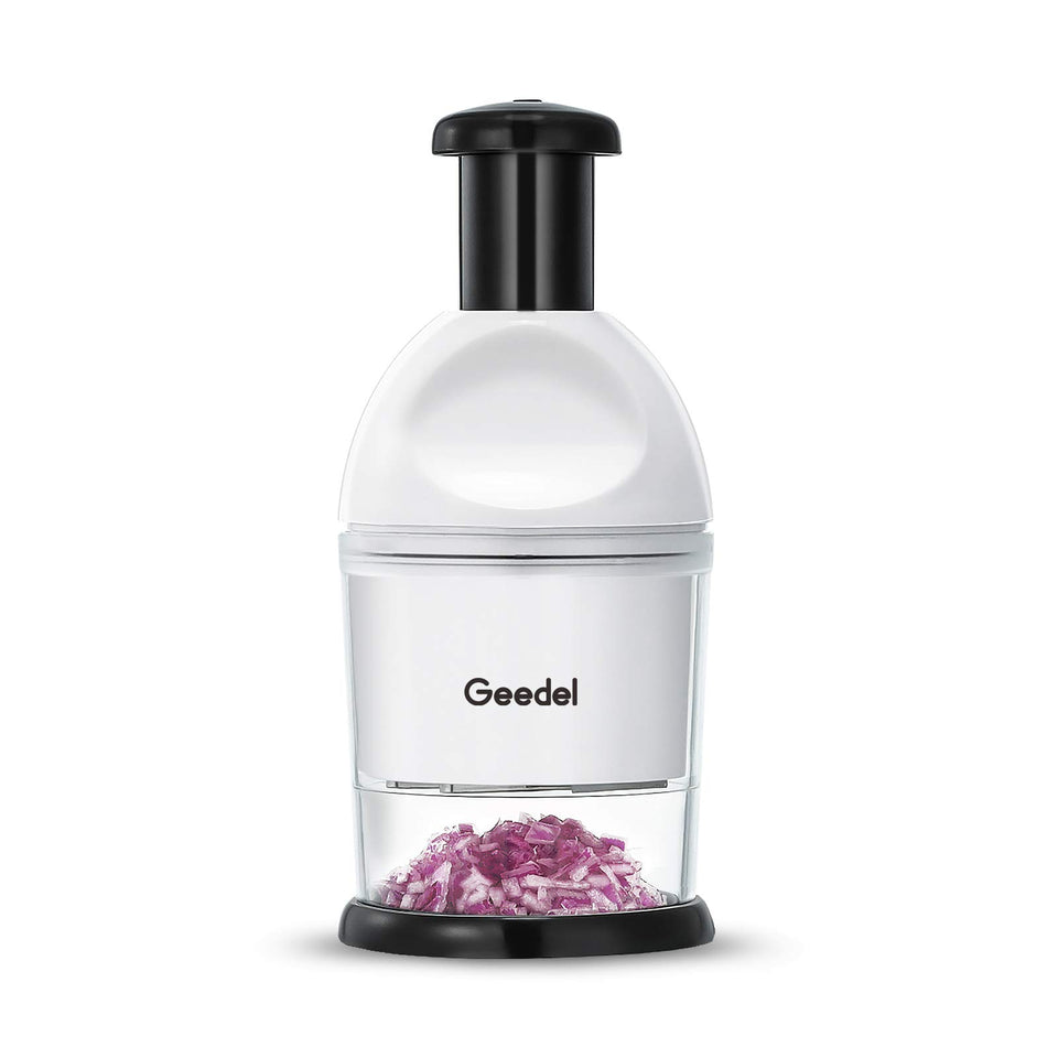 Geedel Food Chopper with dicing blades for quick veggie prep on the cutting board.
