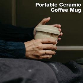 Gencywe ceramic travel mug earth-tone glaze closeup, earthy and stylish