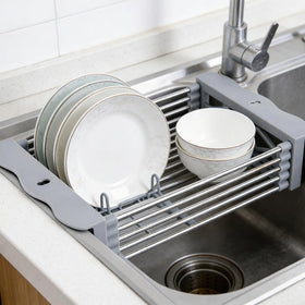 Generic adjustable over-the-sink dish drying rack extended to fit large sinks for efficient drying.