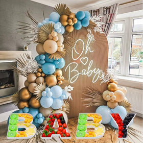 Generic BABY decor and treat display makes a memorable centerpiece for celebrations.