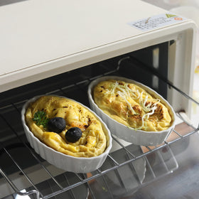 Generic Creme Brulee ramekins used as prep bowls for condiments and toppings.