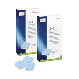 Generic decalcifying tablets in a pack beside a coffee machine for scale removal