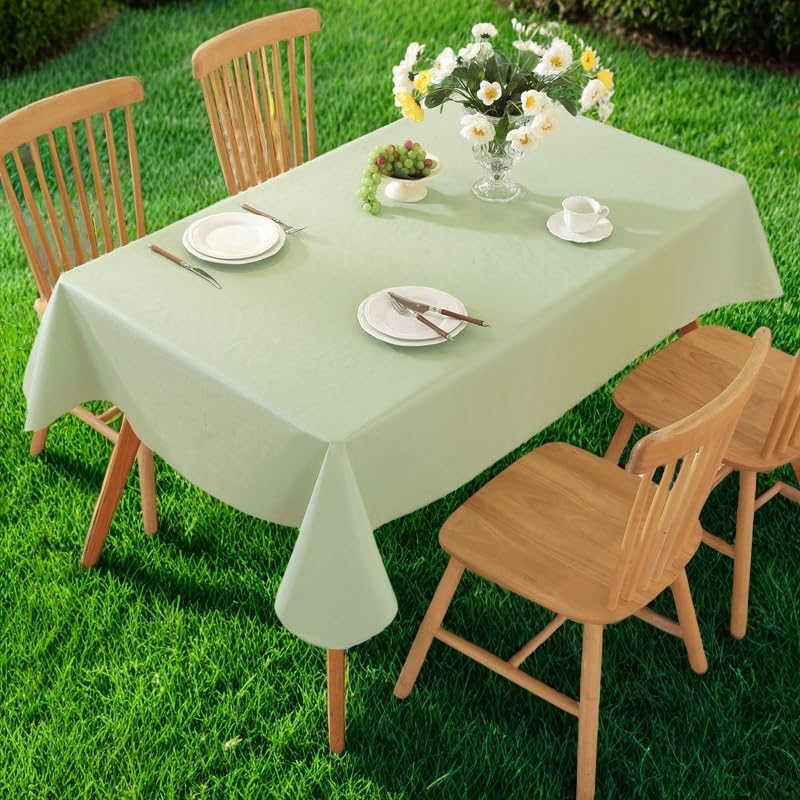 Generic Easy-Clean Tablecloth being wiped with damp cloth.
