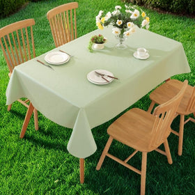 Generic Easy-Clean Tablecloth being wiped with damp cloth.