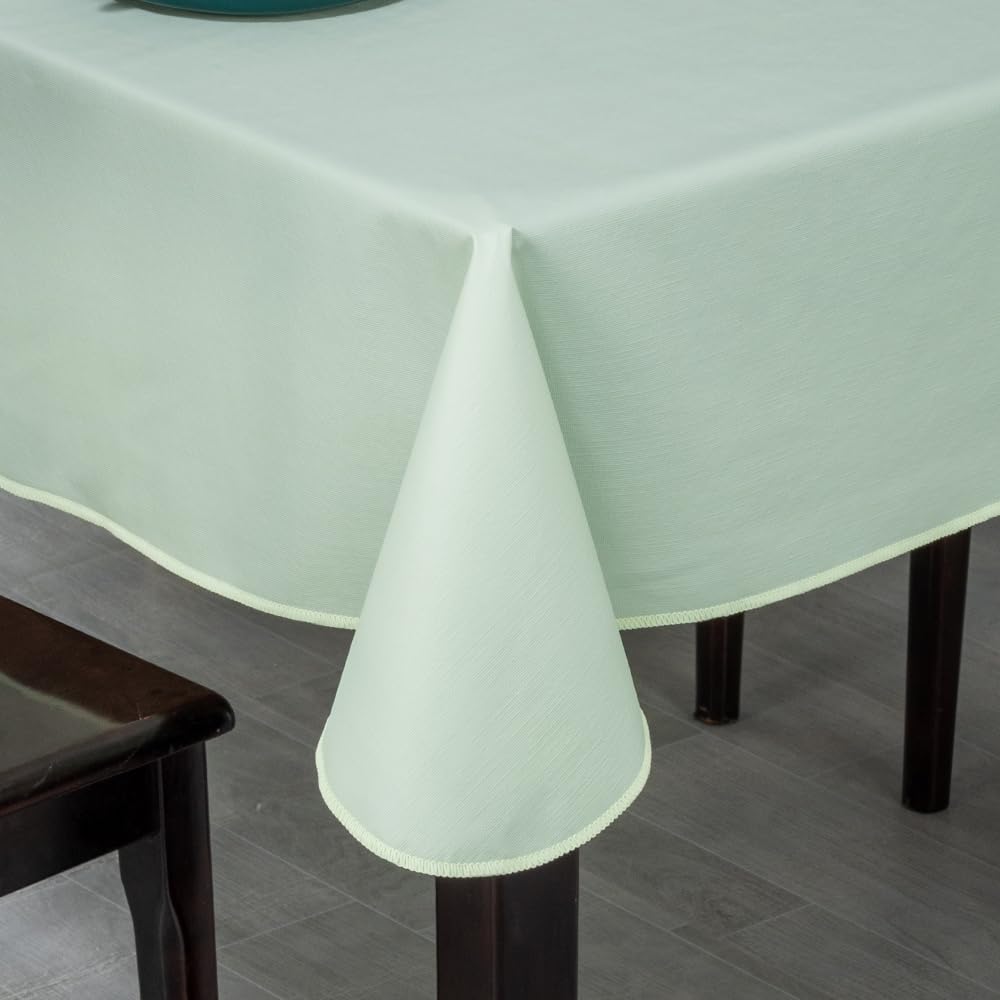 Generic Elegant Rectangular Tablecloth in light green on dining table, stylish and practical.