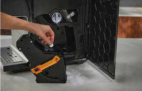 Generic espresso machine cleaning tablet in use, supporting smooth brewing cycles.