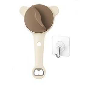 Generic lid-opener-in-use effortlessly cracks vacuum seals on jars and opens bottles.