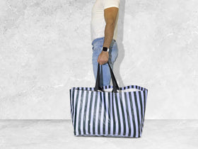 Generic reusable shopping bags in action for groceries, laundry, moving