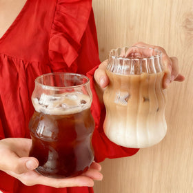 Generic ribbed glass cup 18oz smooth design for easy cleaning.