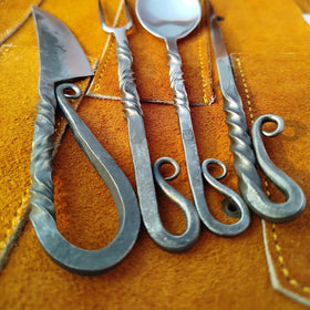 Generic viking-inspired cutlery detail, adds unique Norse flair to your table.