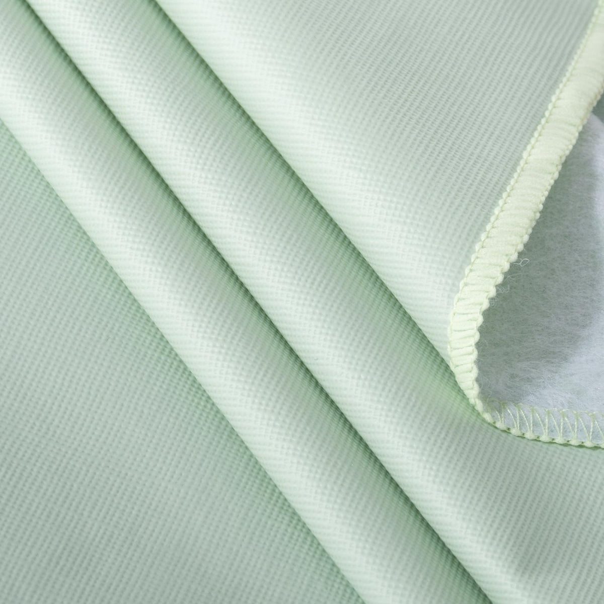 Generic Waterproof Vinyl Tablecloth close-up shows stain resistance during spills.